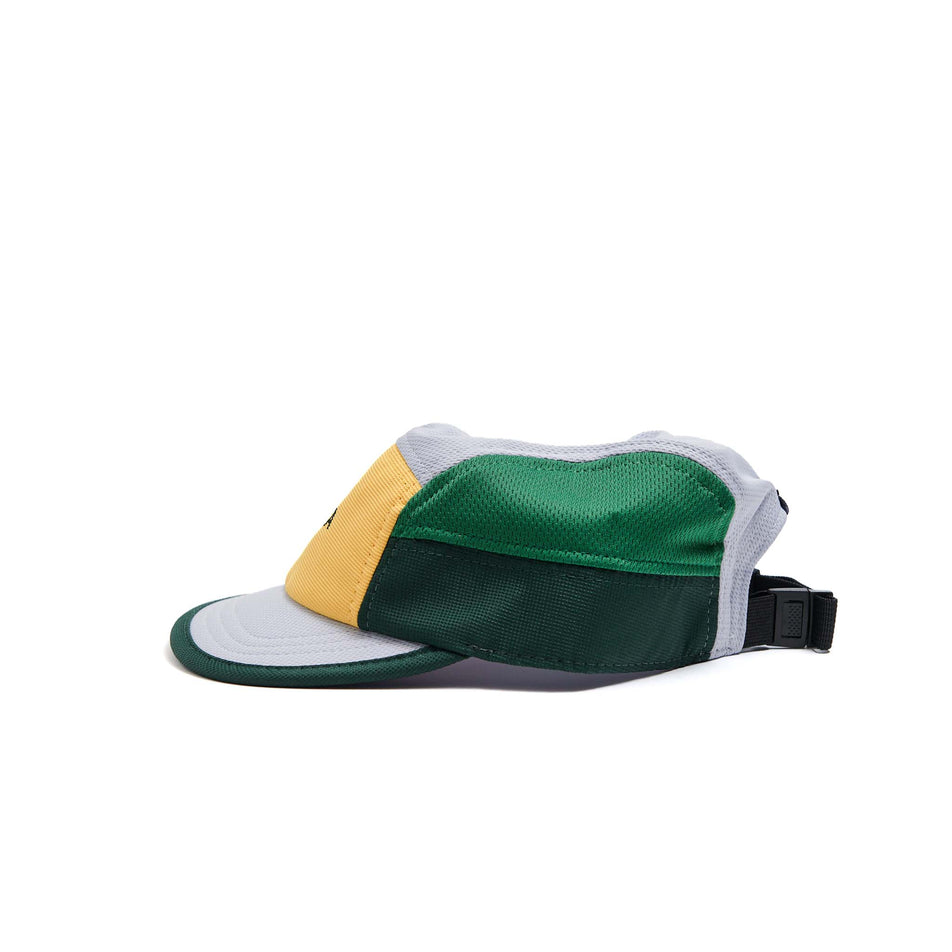 The left-side of a VÅGA Unisex Club Cap in the Racing Green/Light Grey/Sunshine Yellow/Purple colourway. (8595623051426)