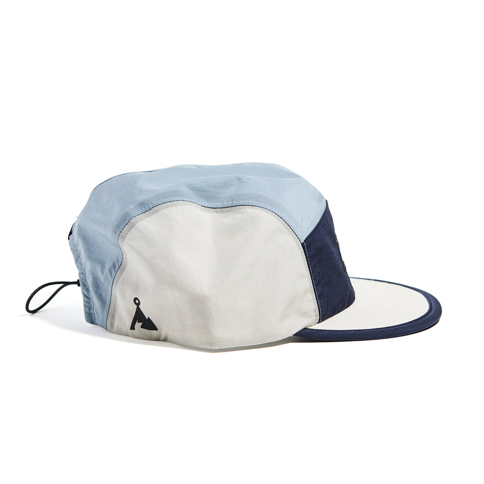 Side view of the VAGA Unisex Pacer Cap in the Postal Blue/Dust Grey/Navy Blue colourway. (8751103049890)