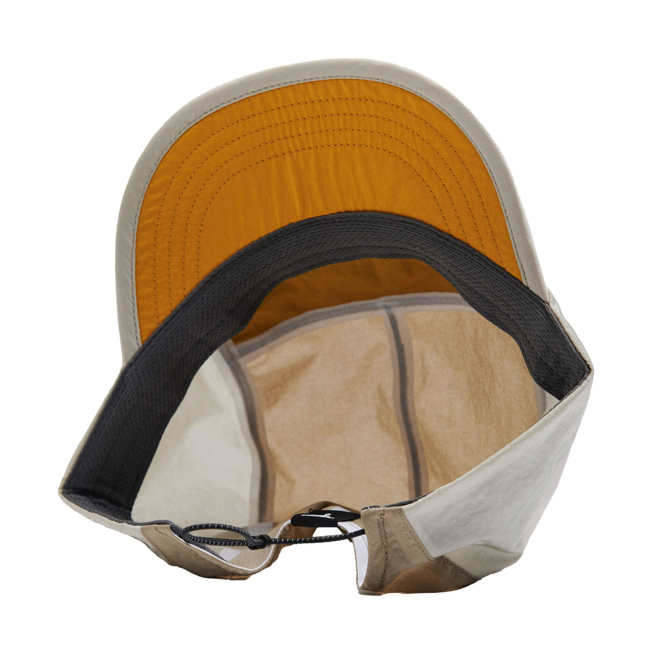 The underside of a VAGA Unisex Pacer Cap in the Burnt Yellow/Taupe colourway. (8596344864930)