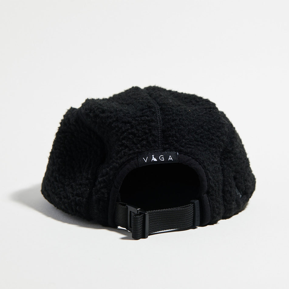 Back view of the VAGA Unisex Teddy Fleece Cap in the Black colourway. (8751586738338)