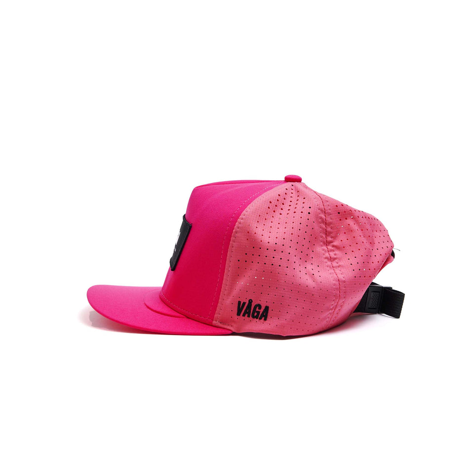 The left-side of a VÅGA Unisex Trucker Cap in the Neon Pink/Navy Blue colourway. (8596201898146)