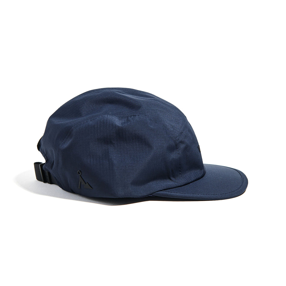 Side view of the VAGA Unisex Fell Cap 2.0 in the Navy Blue colourway. (8751110553762)