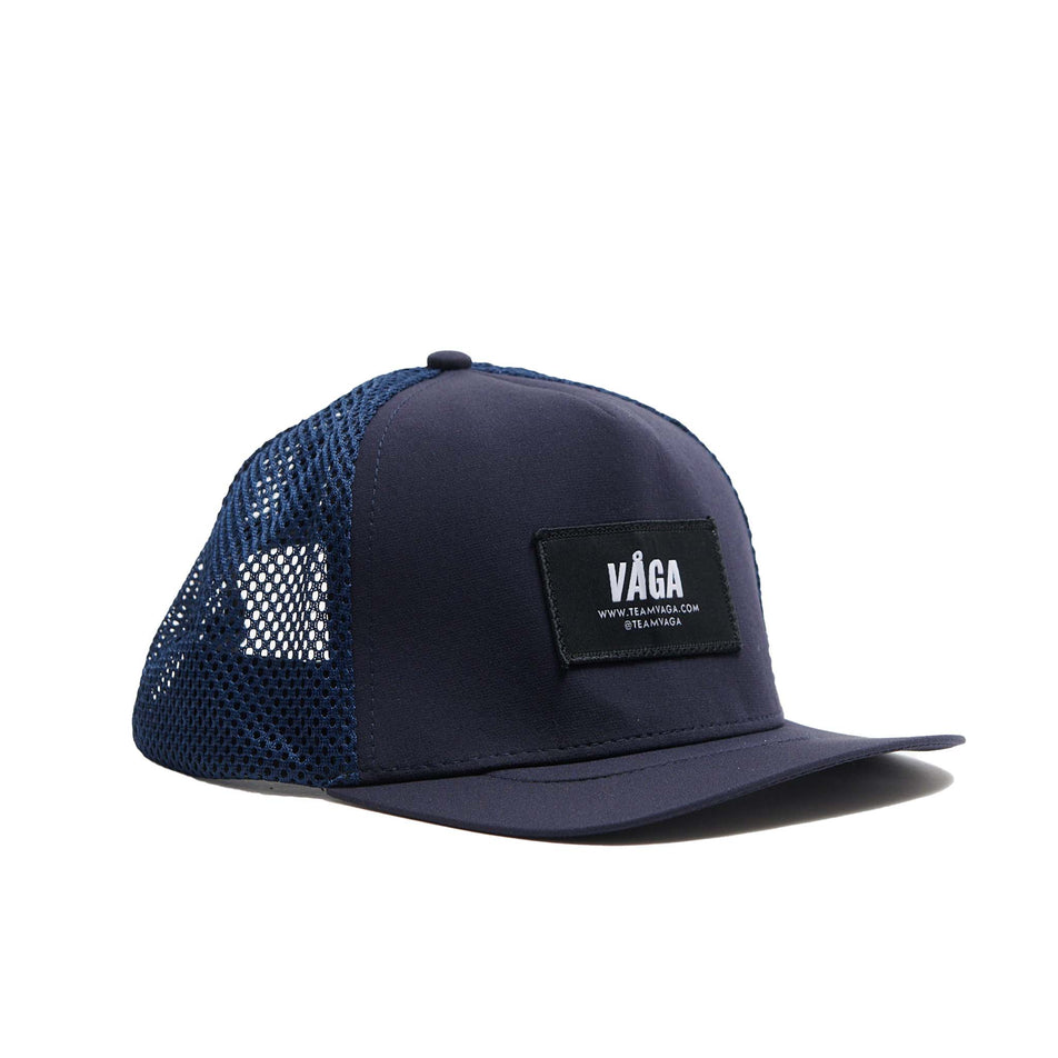 Front view of a VÅGA Unisex Open Mesh Trucker Hat in the Navy Blue colourway (8684637847714)