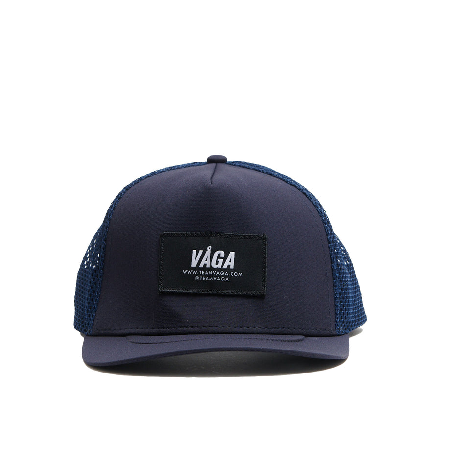Front view of a VÅGA Unisex Open Mesh Trucker Hat in the Navy Blue colourway (8684637847714)