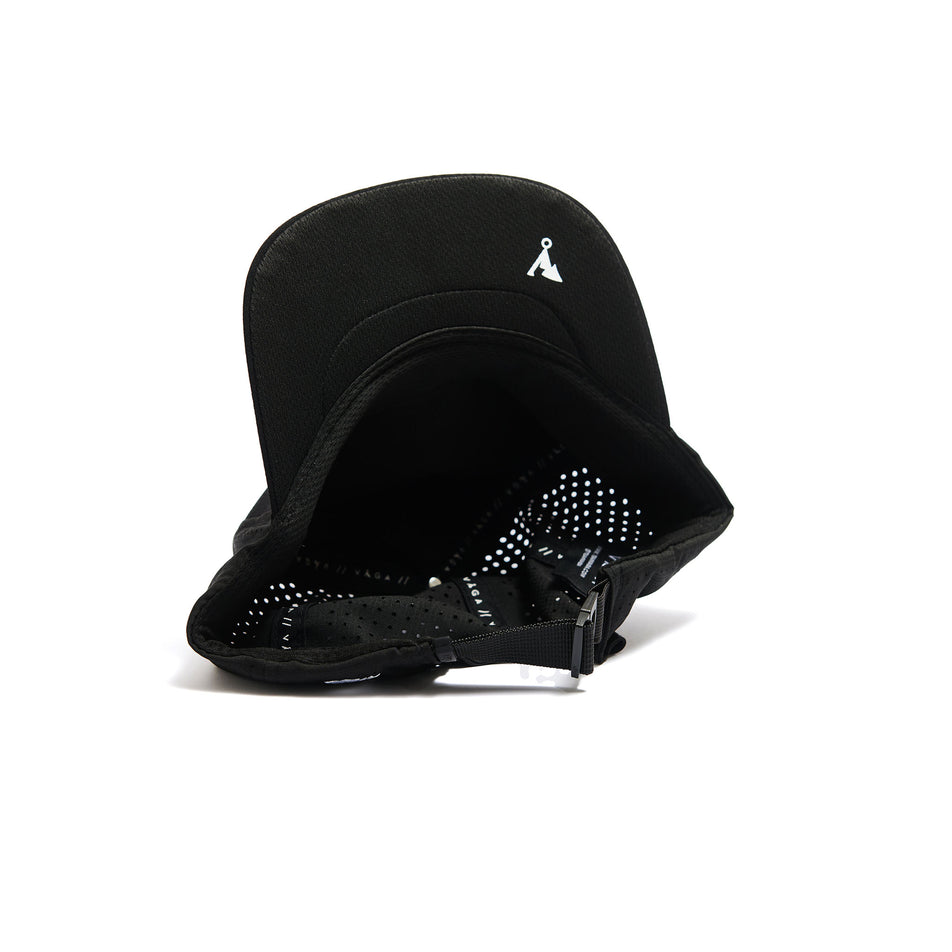 The underside of a VÅGA Unisex Trucker Cap in the Black/Charcoal Grey/White colourway. (8486987792546)