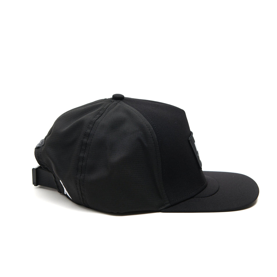 A VAGA Unisex Trucker Cap in the Storm Black colourway. (8551962902690)