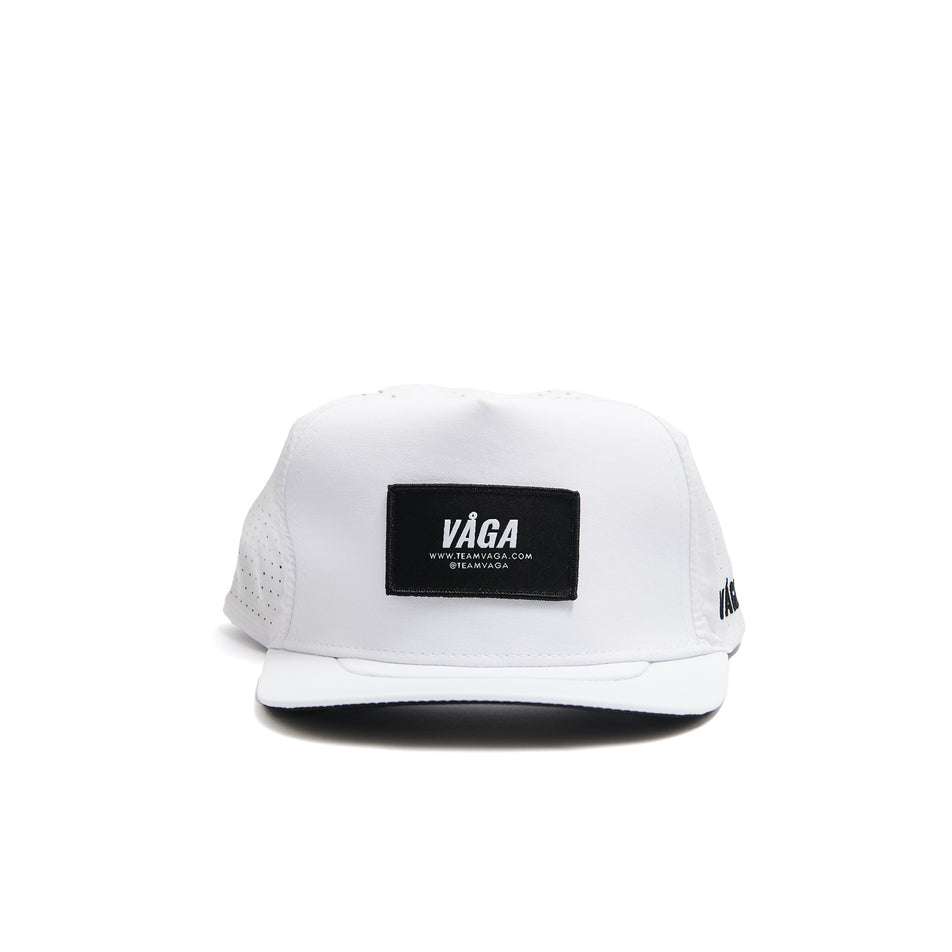 Front view of a VÅGA Unisex Trucker Cap in the White/Black colourway. (8487003095202)
