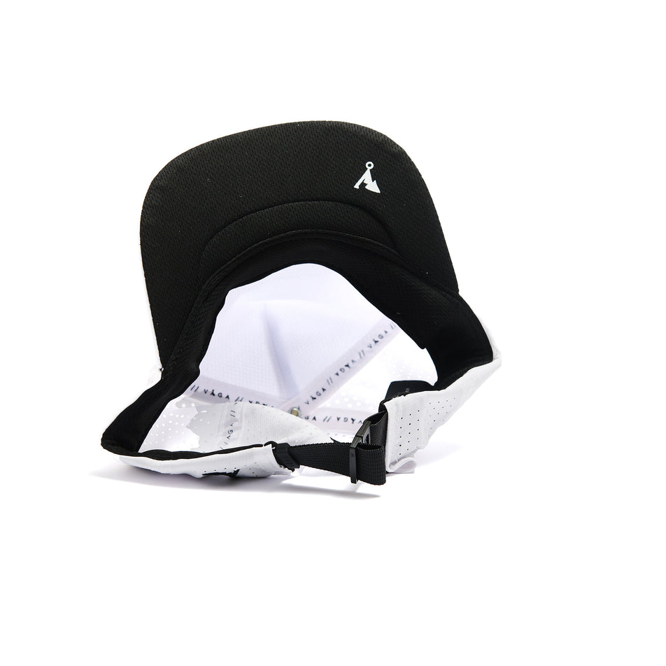 The underside of a VÅGA Unisex Trucker Cap in the White/Black colourway. (8487003095202)