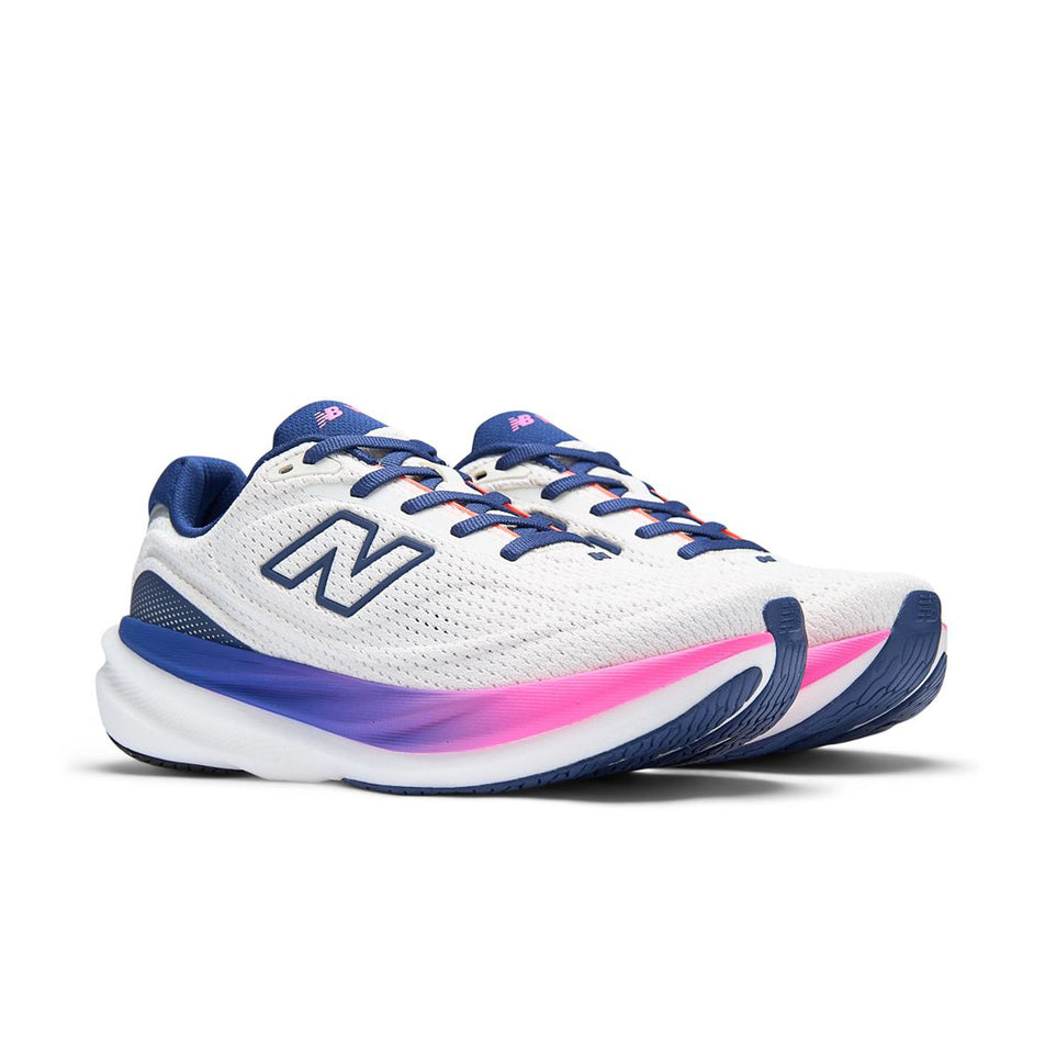 A pair of New Balance Women's 1080 V15 Running Shoes in the Sea Salt/Blue Oyster colourway.