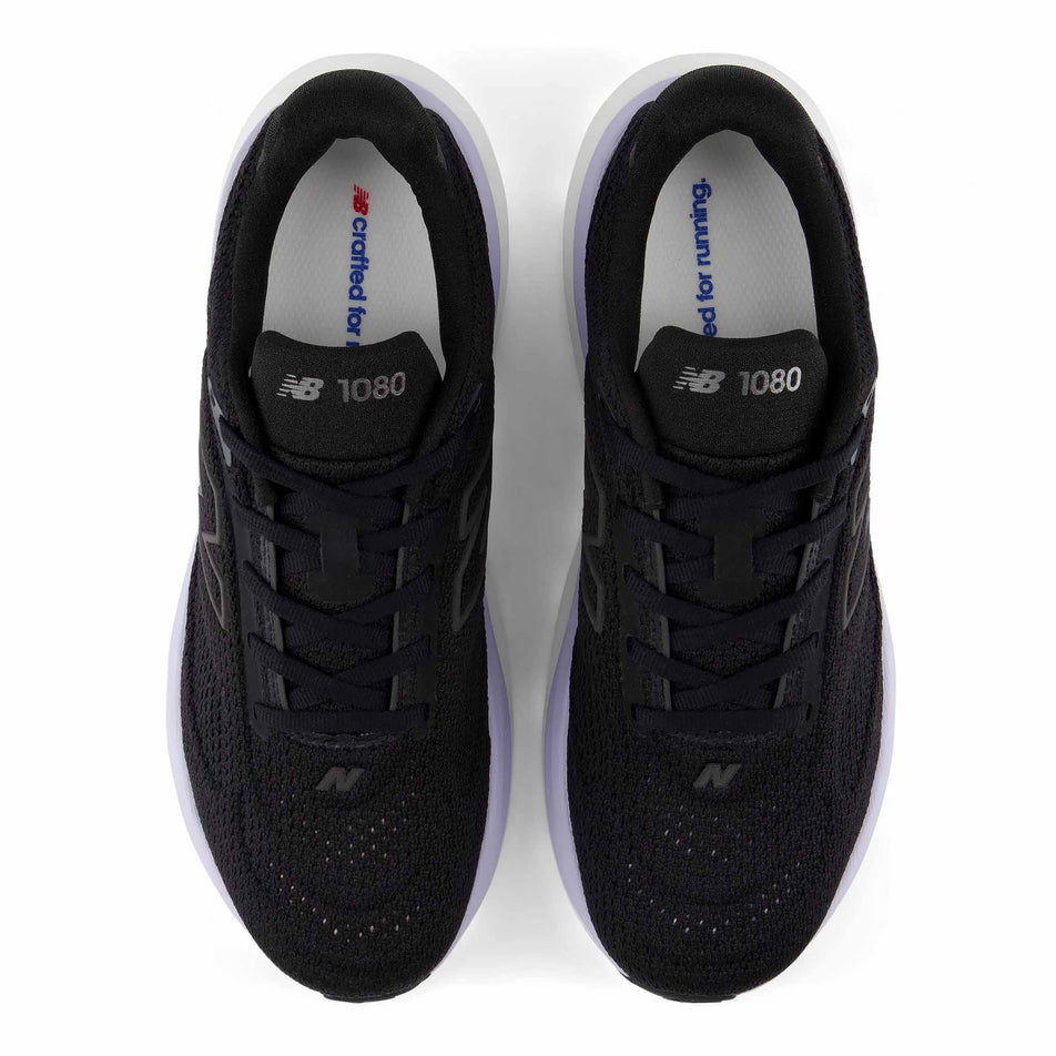 The uppers of a pair of New Balance Women's 1080 V15 Running Shoes in the Smoked Violet colourway.