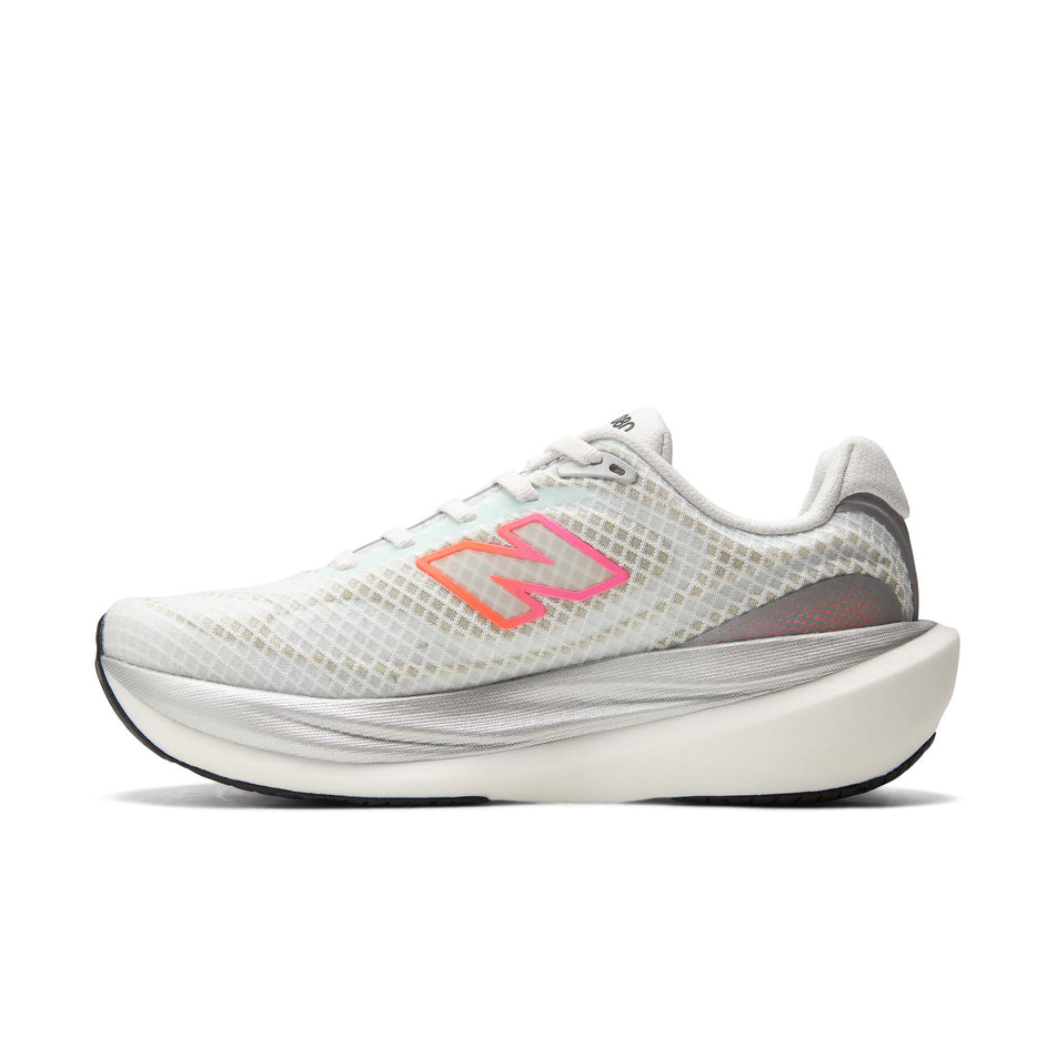 Medial view of the right shoe from a pair of New Balance Women's 1080 V15 Running Shoes in the White/Pink Heat colourway.