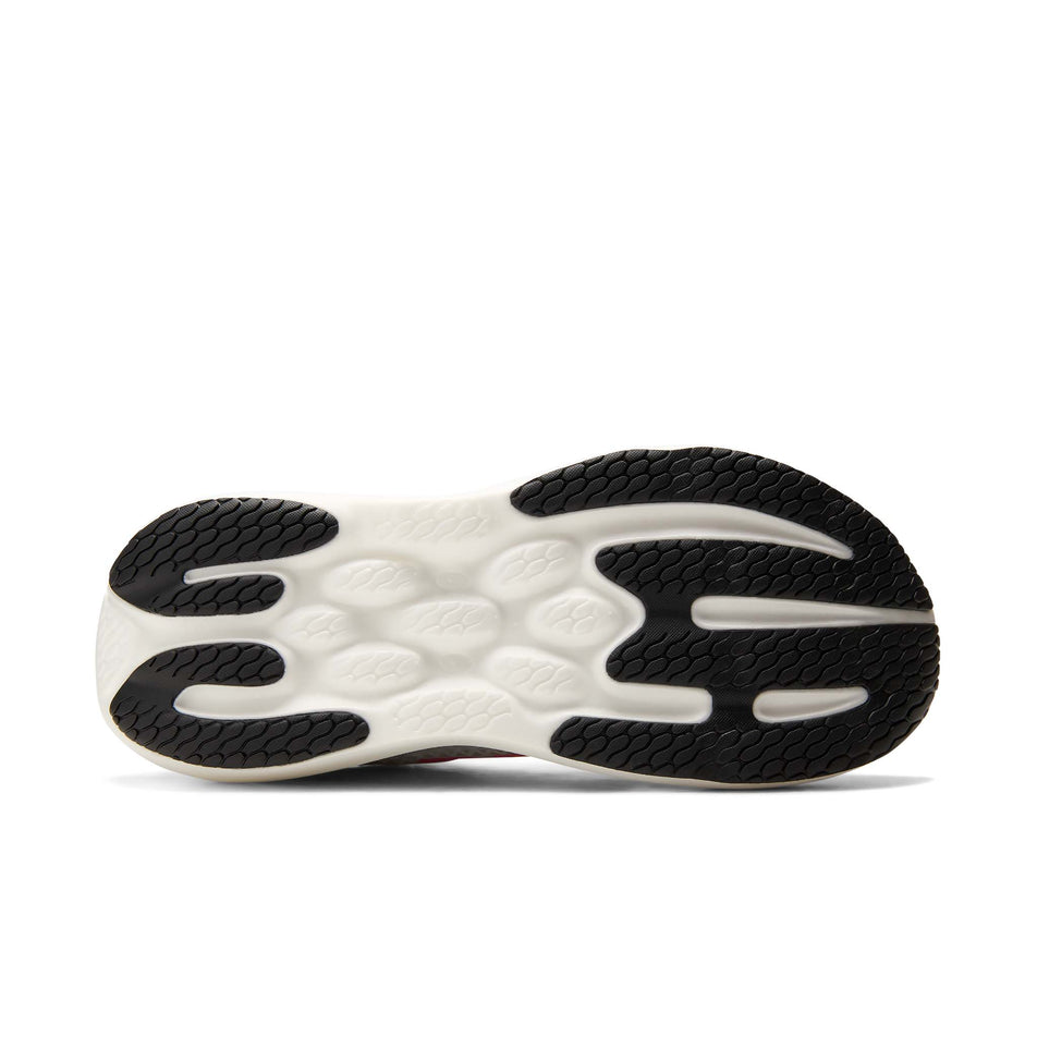 The outsole of the right shoe from a pair of New Balance Women's 1080 V15 Running Shoes in the White/Pink Heat colourway.