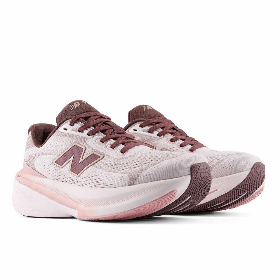 A pair of New Balance Women's Fresh Foam X 860 V15 Running Shoes in the Pink Salt/Pebble colourway.