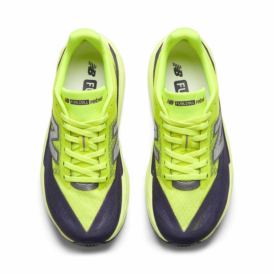 The uppers of a pair of New Balance Women's Fuelcell Rebel V5 Running Shoes in the Alkaline Green/Boysenberry colourway.