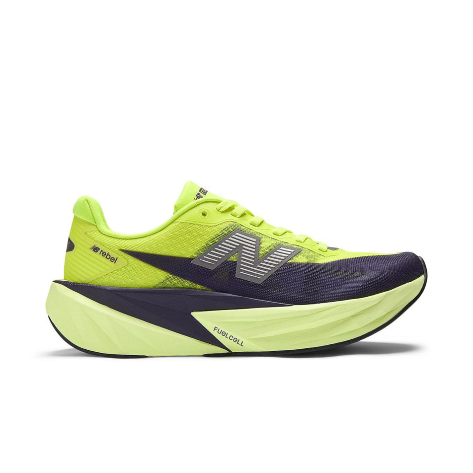 Lateral view of the right shoe from a pair of New Balance Women's Fuelcell Rebel V5 Running Shoes in the Alkaline Green/Boysenberry colourway.