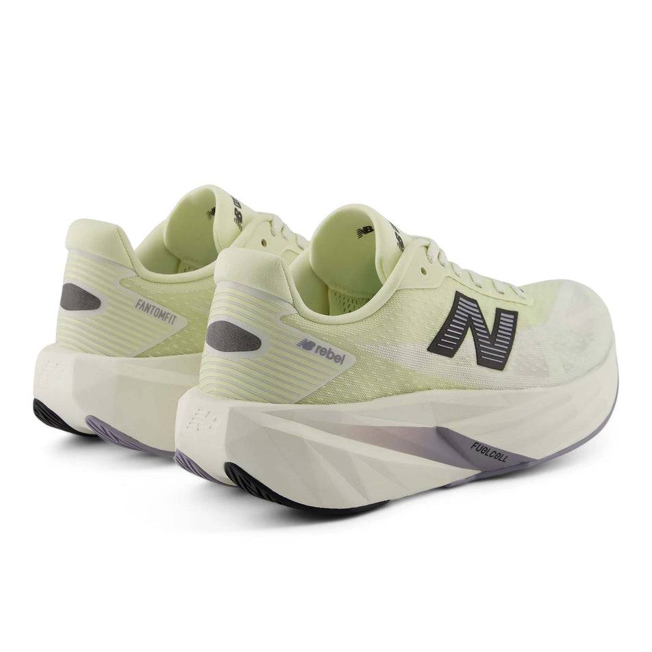 A pair of New Balance Women's FuelCell Rebel V5 Running Shoes in the Pistachio Butter/Sea Salt colourway.