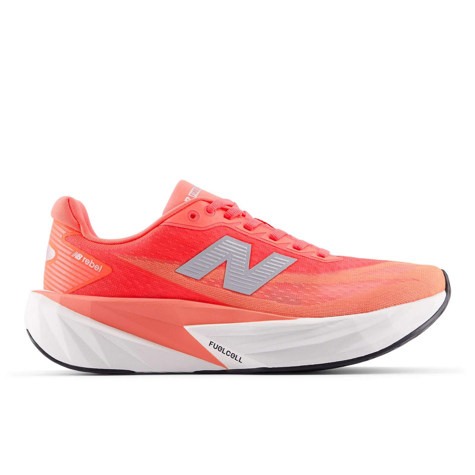 Lateral view of the right shoe from a pair of New Balance Women's FuelCell Rebel v5 Running Shoes in the Urgent Red colourway. (8712249475234)