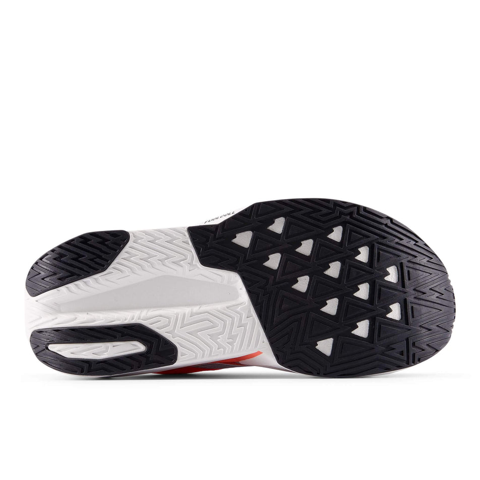 The outsole of the right shoe from a pair of New Balance Women's FuelCell Rebel v5 Running Shoes in the Urgent Red colourway. (8712249475234)