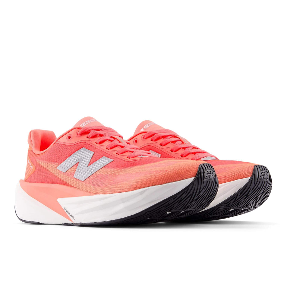 A pair of New Balance Women's FuelCell Rebel v5 Running Shoes in the Urgent Red colourway. (8712249475234)