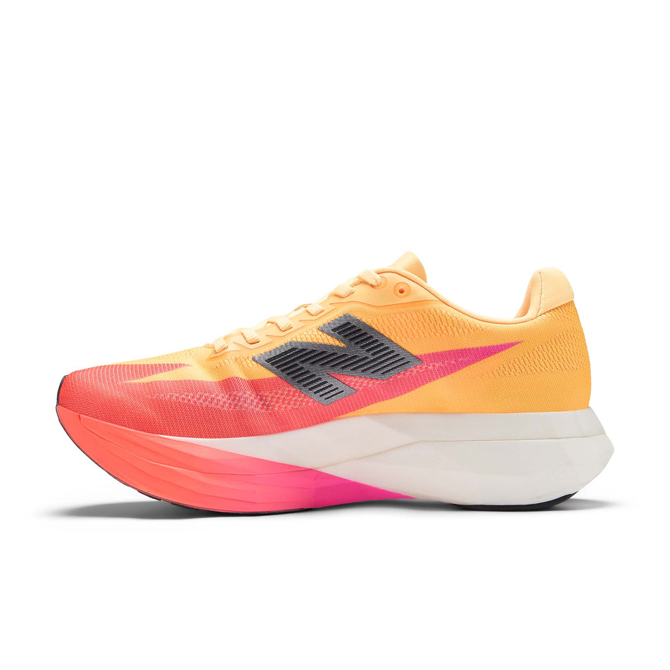Medial view of the right shoe from a pair of New Balance Women's FuelCell SuperComp Elite V5 Running Shoes in the Tangerine Heat colourway.