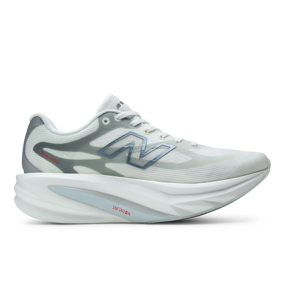 Lateral view of the right shoe from a pair of New Balance Women's SC Rebel Running Shoes in the Sea Salt/Neo Flame colourway.