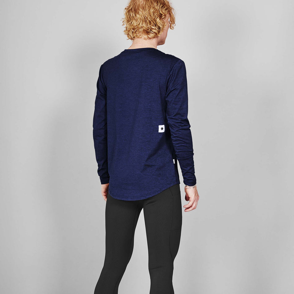 Back view of a model wearing the SAYSKY Men's Clean Pace Long Sleeve in the Blue colourway. (8731613823138)