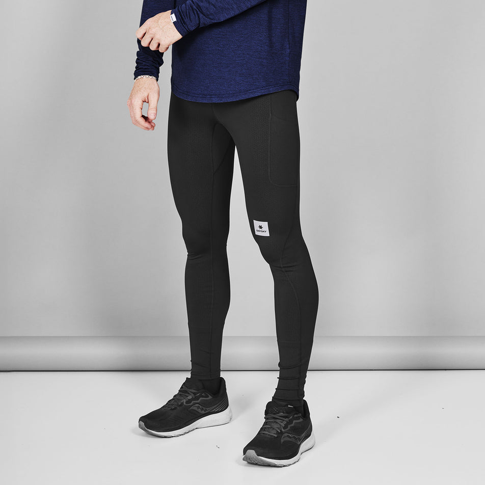Front view of a model wearing the SAYSKY Men's Combat+ Long Tights in the Black colourway. (8731618902178)