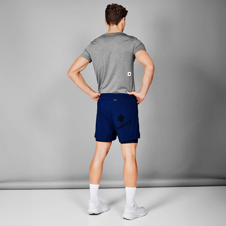 Back view of a model wearing the SAYSKY Men's 2 In 1 Pace Shorts 5