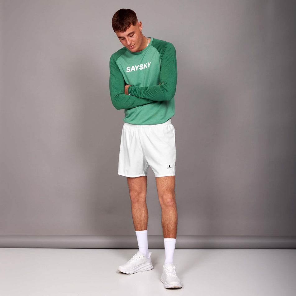 Front view of a model wearing a pair of the SAYSKY Men's Pace Shorts 5