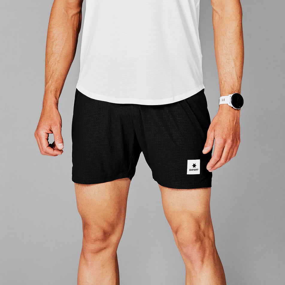 Front view of a model wearing a pair of SAYSKY Men's Flow Shorts 5