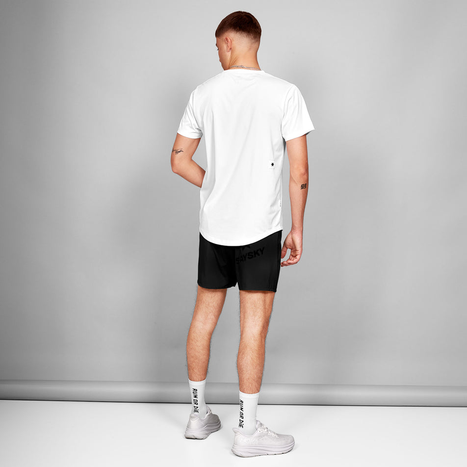 Back view of a model wearing the SAYSKY Men's Clean Combat Pro T-Shirt in the White colourway. Model is also wearing shorts, socks and shoes. (8602103316642)