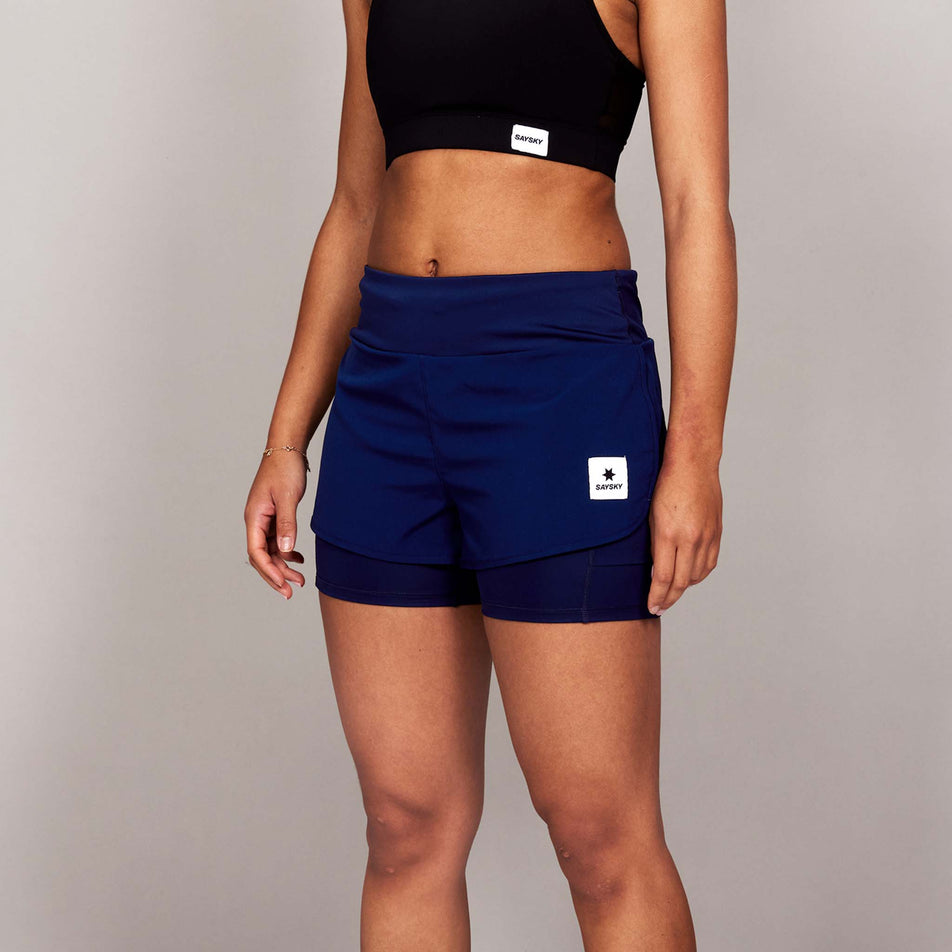 Front view of a model wearing the SAYSKY Women's 2 In 1 Pace Shorts 3