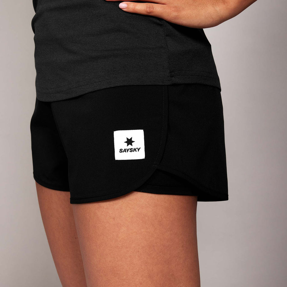 Side view of a model wearing the SAYSKY Women's Pace Shorts 3