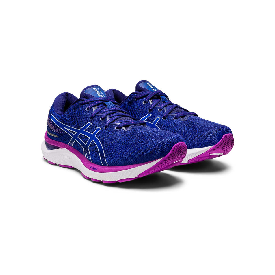 Anterior angled view of women's asics gel-cumulus 24 running shoes in blue (7520599539874)