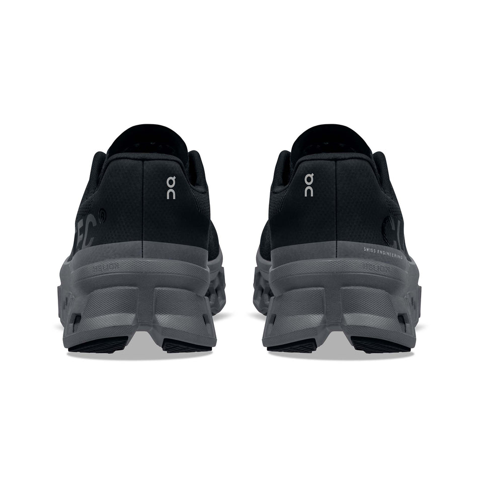 Pair posterior view of On Women's Cloudmonster Running Shoes in black (7724309774498)