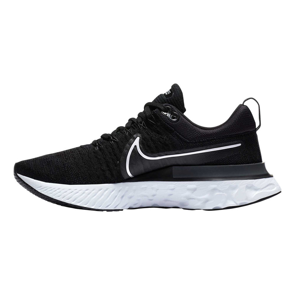 Medial side of the right shoe from a pair of women's Nike React Infinity Run Flyknit 2 (6899373539490)