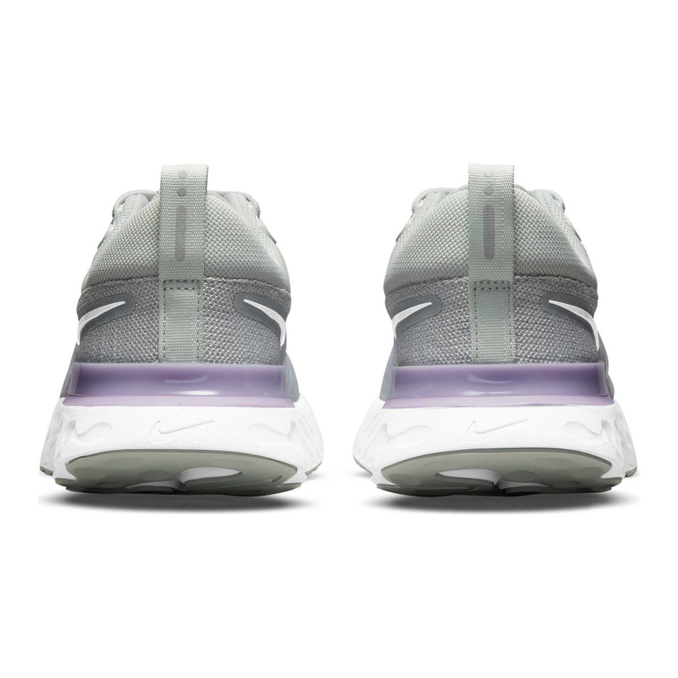 Heel counter and crash pad areas on the left and right shoes from a pair of women's Nike React Infinity Run Flyknit 2 (6899757285538)