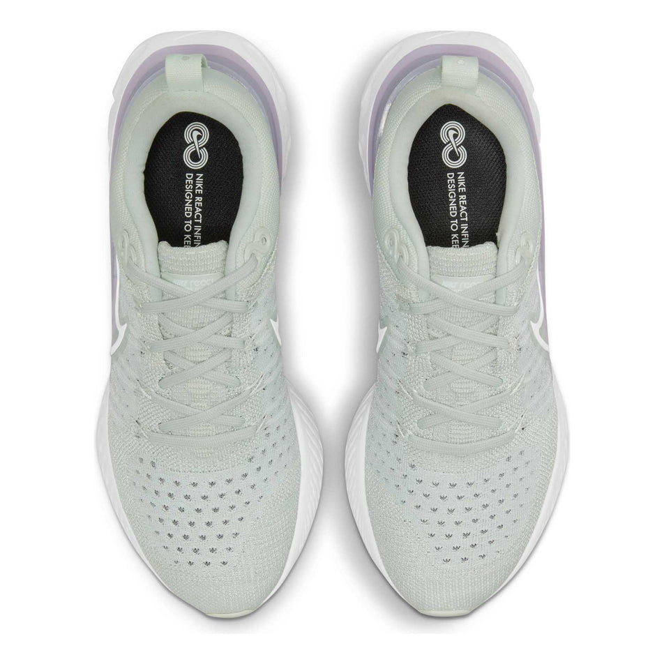 The full upper and lace areas on the right and left shoes from a pair of women's Nike React Infinity Run Flyknit 2 (6899757285538)