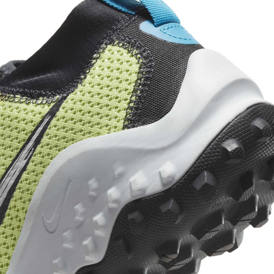 Rear area of the left shoe from a pair of women's Nike Wildhorse 7 with outsole lugs on display (6899418988706)
