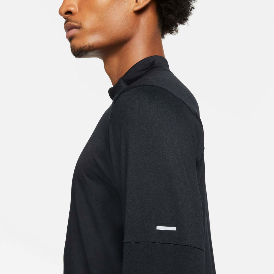 Side shoulder view of Nike Men's Dri-Fit Element Top HZ in black (7682948366498)