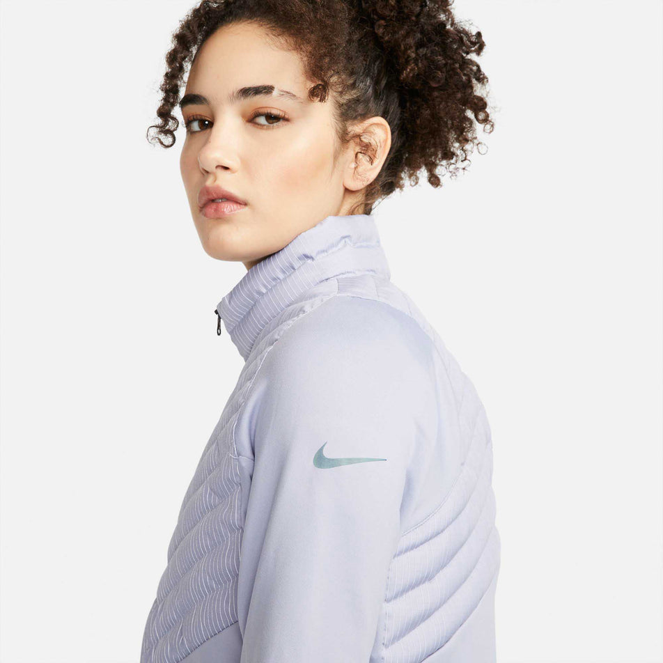 Side view of women's nike tf run division hybrid jacket (6918124863650)