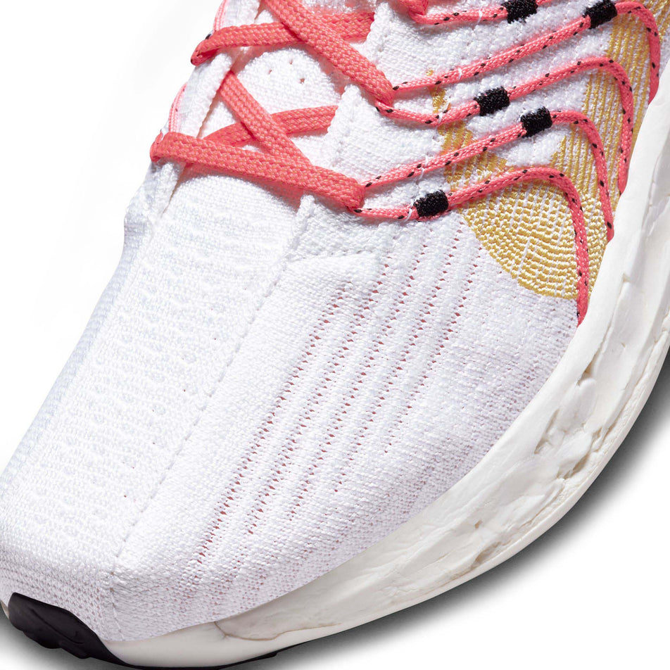 The toe box on the left shoe from a pair of Nike Women's Pegasus Turbo Next Nature Road Running Shoes (7867329970338)