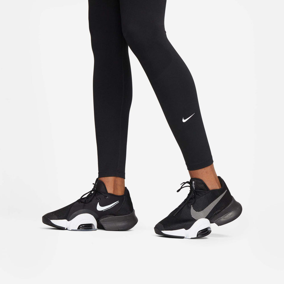 Cuff view of Nike Women's One DF HR Running Tight in black. (7729569136802)
