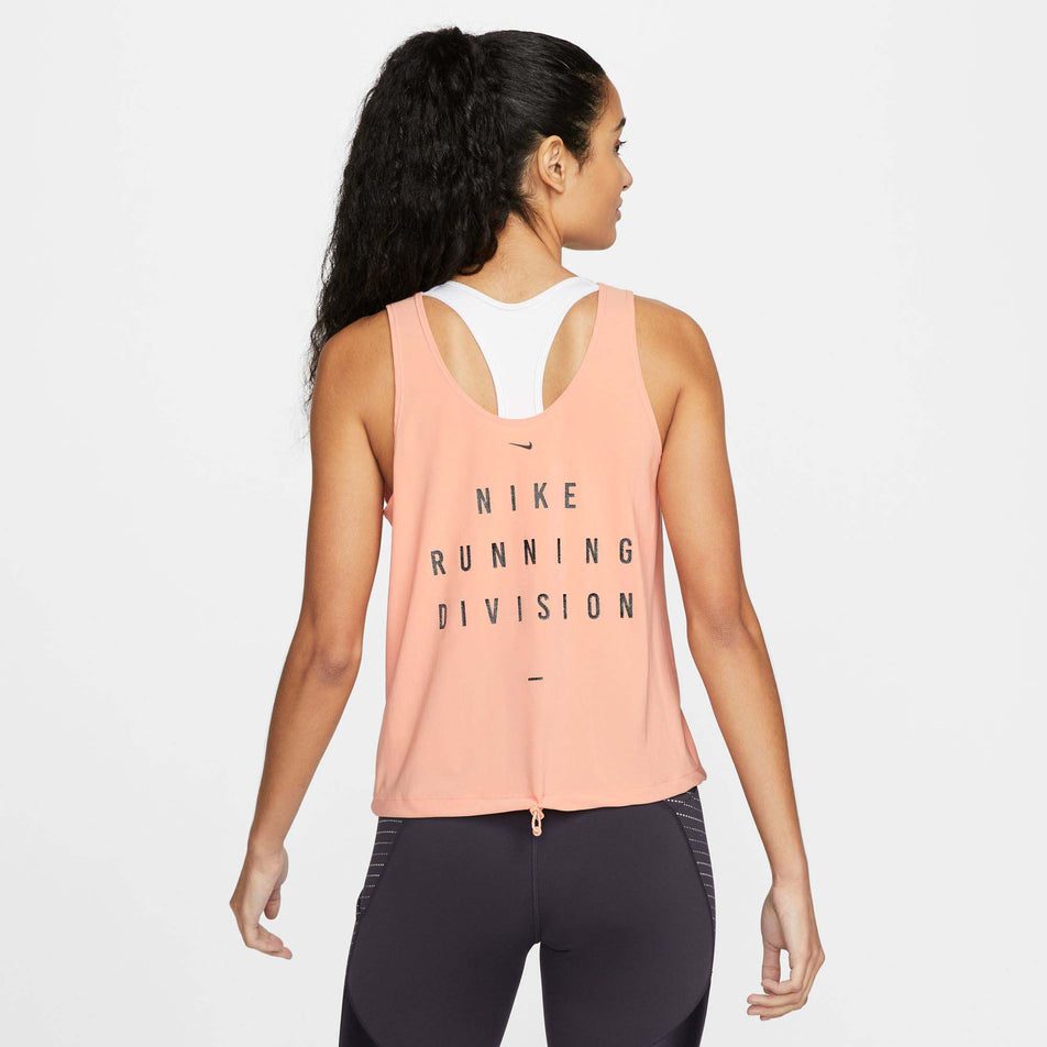 Behind view of women's nike df run dvn cnvrtbl tank (7386205094050)