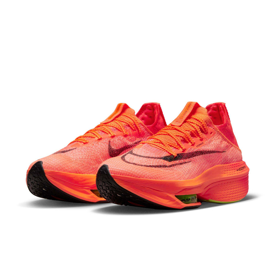 Anterior angled view of women's nike air zoom alphafly next% flyknit 2 running shoes in orange (7600235315362)