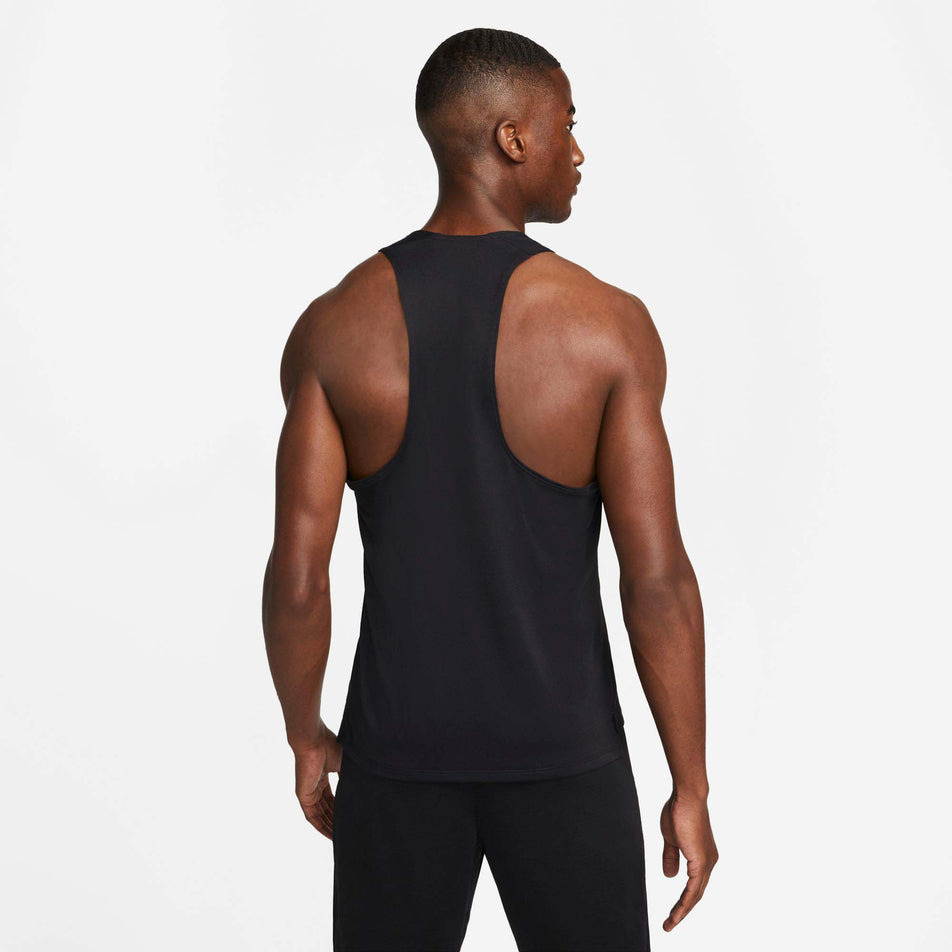 Back view of a model wearing a Nike Men's Dri-FIT Fast Racing Singlet (7876622614690)