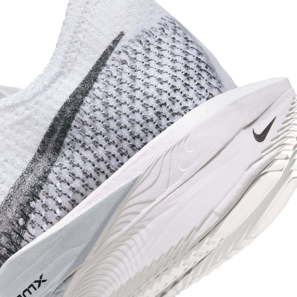 The lateral side of the heel on the left shoe from a pair of Nike Women's Vaporfly 3 Road Racing Shoes in the White/DK Smoke Grey-Particle Grey colourway (7867364049058)