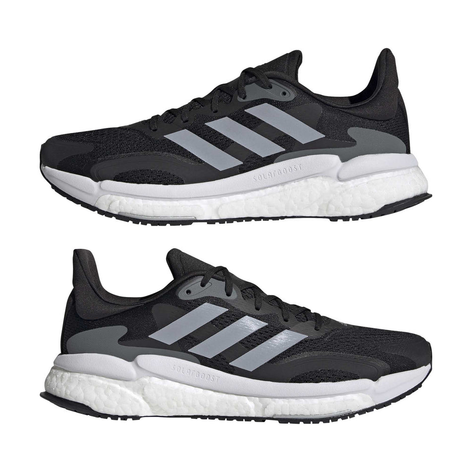 Lateral sides of the left and right shoes from a pair of men's adidas Solar Boost 3 (6893369131170)