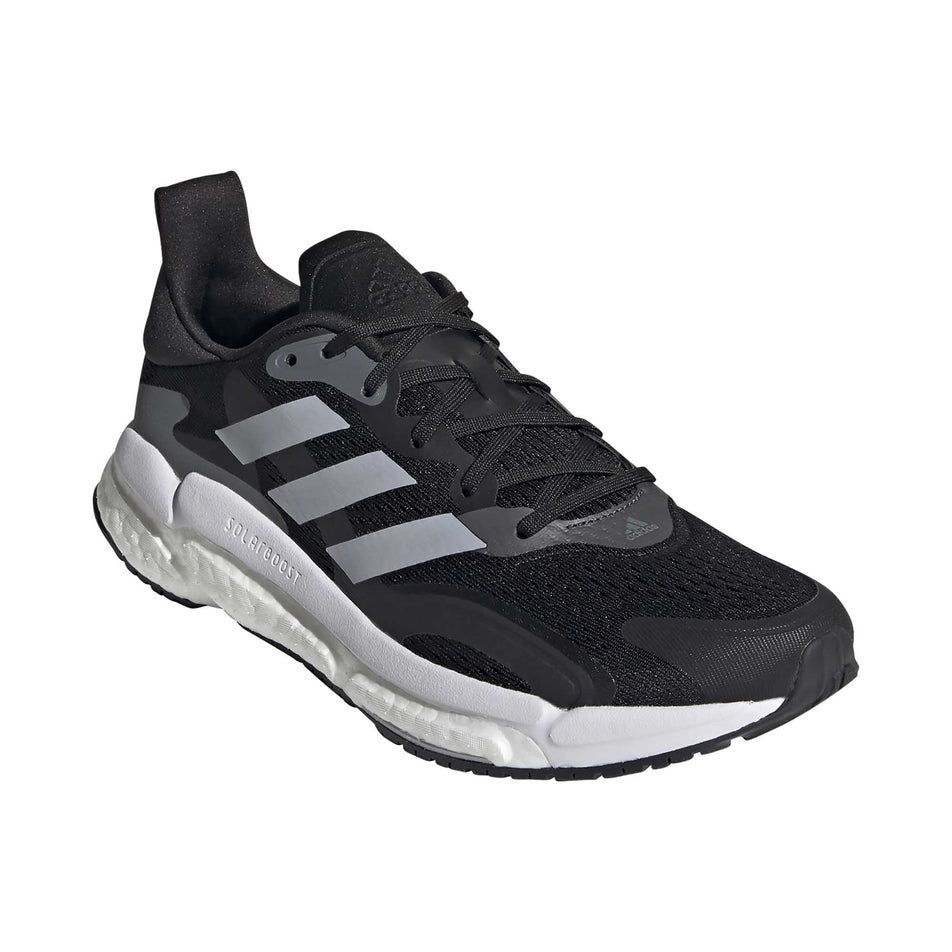 The right shoe from a pair of women's adidas Solar Boost 3 (6893723287714)