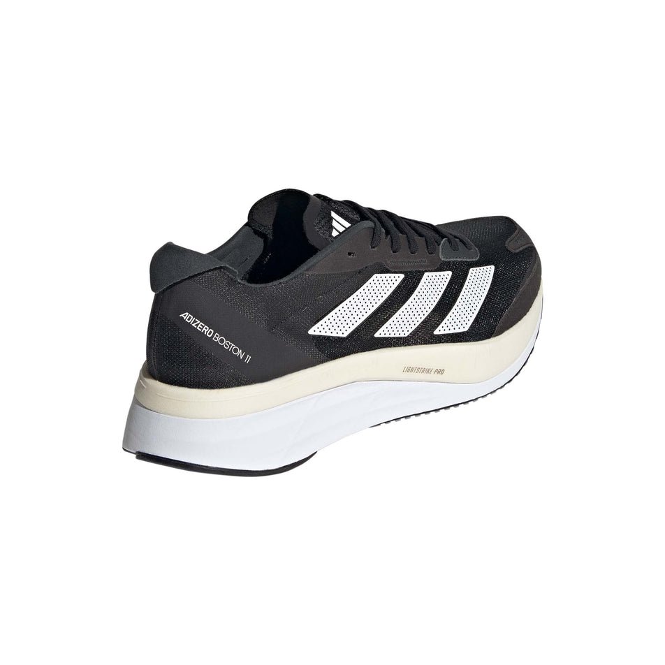 Posterior angled view of men's adidas adizero boston 11 running shoes in black (7510265299106)